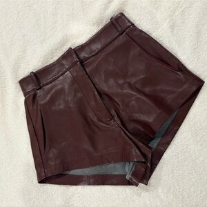 Amanda Uprichard x REVOLVE Kelso Faux Leather Shorts in Russet
